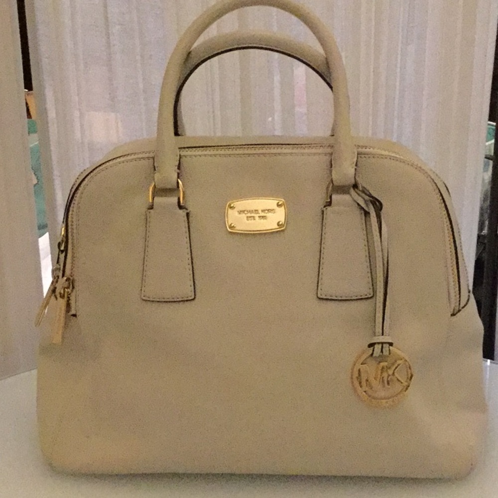 Michael Kors Ivory pebbled leather handbag.